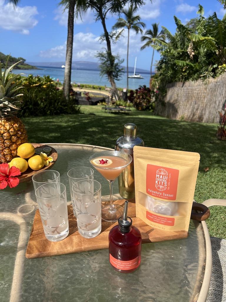 Natural cocktail mix a pineapple on a table with palm trees in the background